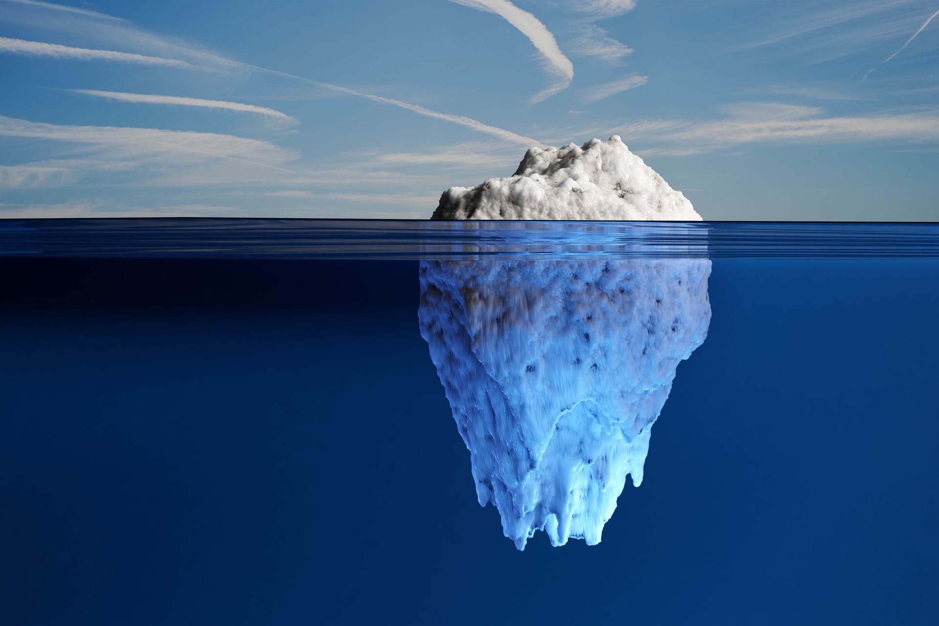 White iceberg exposing small part out of water and hiding most part under the ocean under blue sky. Illustration of the idiom of the tip of the iceberg
